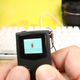 Illustration for article titled Thumbs On With The Tiniest Game Boy Ever